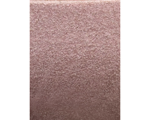 Prim-plan al unei pietre de beton cu suprafață aspră