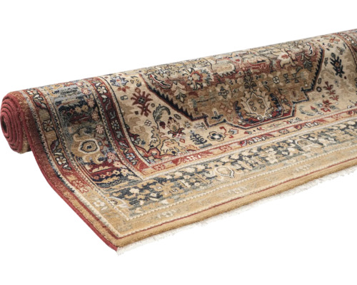 Covor rulat cu model tradițional