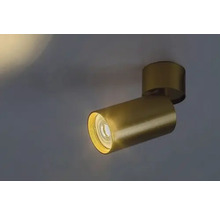 Lumină de plafon aurie cu o rază de lumină