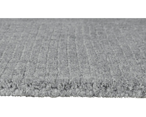 Prim-plan cu un covor gri