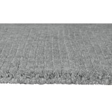 Prim-plan al unui covor gri