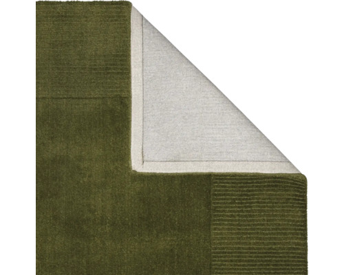 Imagine detaliată cu un covor verde cu fir înalt și spate textil