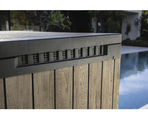 Imagine detaliată a unui placaj de cadă cu hidromasaj cu structură de lemn și fante de aerisire