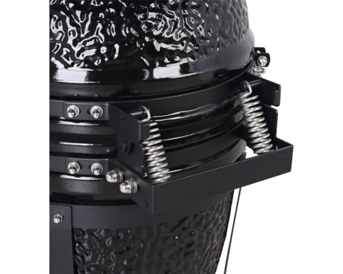 Prim-plan al unui grătar ceramic cu mecanism cu arc