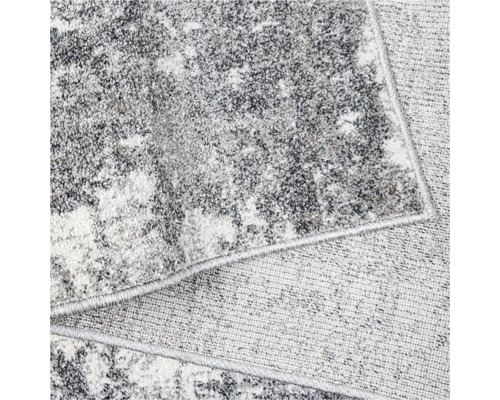 Prim-plan al unui covor cu model