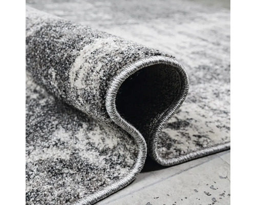 Covor gri cu model abstract, rulat