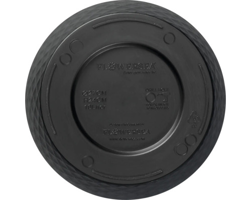 Partea inferioară a unui ghiveci negru cu informații despre producător