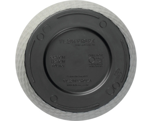 Partea inferioară a unui vas de plantare cu informații despre dimensiune, volum și găuri de foraj pentru drenaj