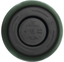 Partea inferioară a unui ghiveci de flori cu găuri de foraj pentru drenaj