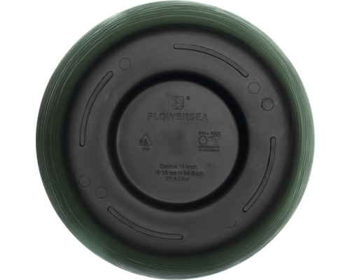 Partea inferioară a unui ghiveci de flori cu găuri de foraj pentru drenaj