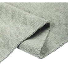 Imagine detaliată a unui covor gri texturat