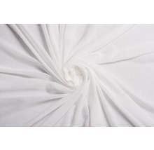 Material alb pentru perdele, dispus în formă spiralată