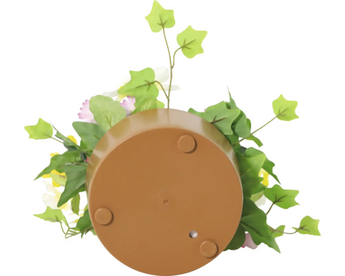 Partea inferioară a unui ghiveci de flori cu flori artificiale