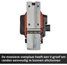 Vedere de jos a unei rindele electrice cu o talpă metalică prevăzută cu o canelură în V pentru teșirea marginilor.