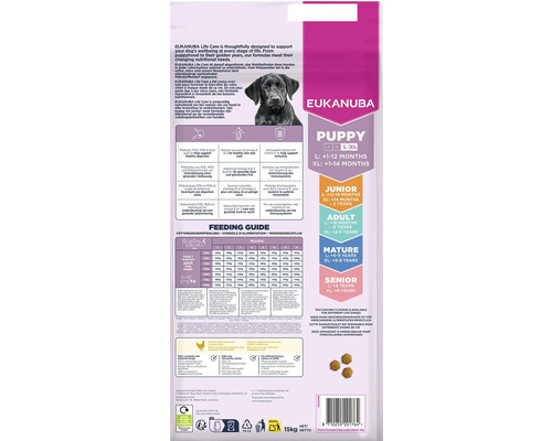 Spatele ambalajului hranei uscate Eukanuba Puppy pentru căței de talie mare cu pui, cu tabel de dozaj și greutate netă de 15 kilograme.