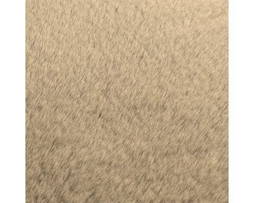 Vedere de aproape a texturii unei blănuri artificiale moi pentru covoare sau textile.