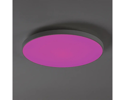 Plafonieră LED rotundă cu design plat și schimbător de culori pentru iluminare versatilă.