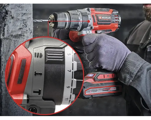 Mașină de găurit și înșurubat cu percuție cu acumulator Einhell în utilizare cu detalierea setărilor de cuplu și funcții.