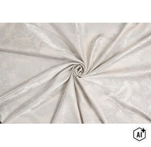 Material textil cu model marmorat și pliuri drapate (Image AI modified or generated)