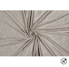 Material textil drapat cu o suprafață structurată cu aspect de piele (Image AI modified or generated)
