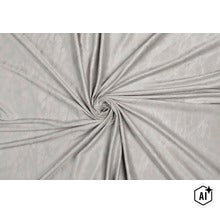 Material textil cu aspect de marmură dispus în falduri (Image AI modified or generated)
