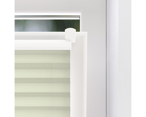 Imagine detaliată a unui jaluzele plisate pe o fereastră