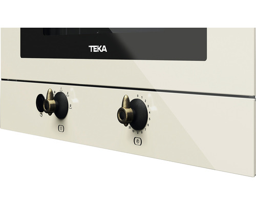 Prim-plan cuptor Teka cu butoane rotative pentru selectarea temperaturii și a funcțiilor.