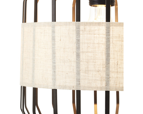 Imagine detaliată cu o lampă cu abajur din material textil și cadru metalic