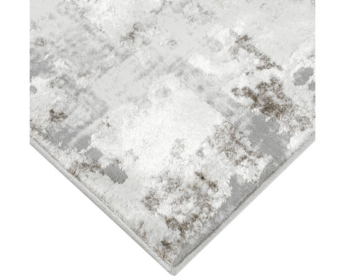 Detaliu covor cu model abstract