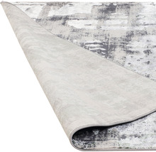 Covor gri cu model abstract.