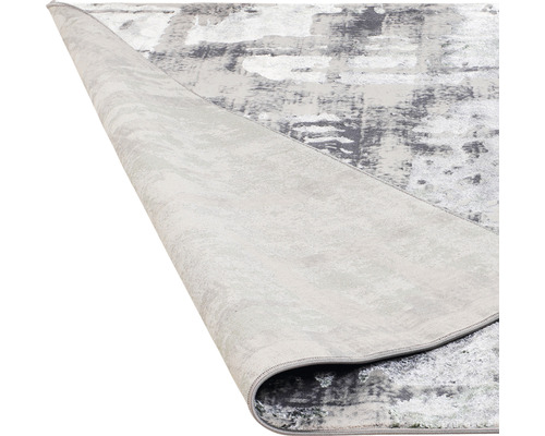 Covor gri cu model abstract.