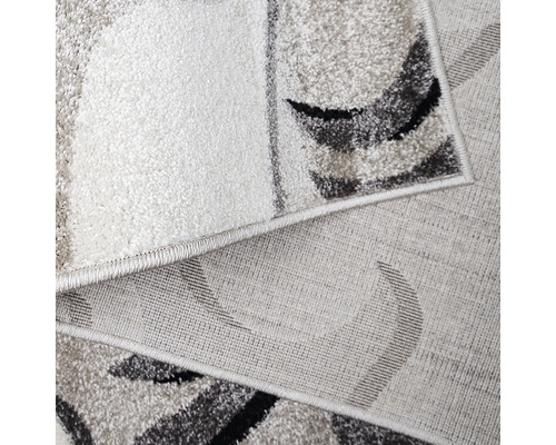 Covor decorativ cu model abstract.