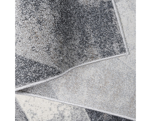 Prim-plan al unui covor abstract