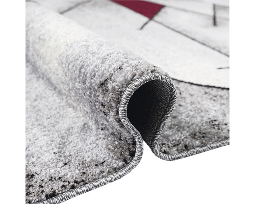 Prim-plan cu un covor gri cu model abstract