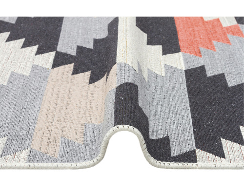 Prim-plan al unui covor cu model