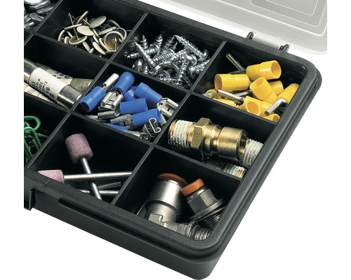 Cutie de sortiment plină cu șuruburi, dibluri, siguranțe și piese mici