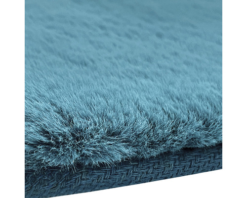 Vizualizare detaliată a unui covor cu fire lungi