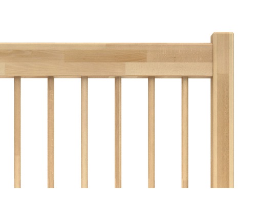 Imagine detaliată a unui pat de copil din lemn cu gratii