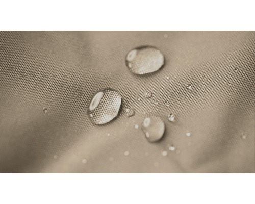 Prim-plan cu picături de apă pe țesătură hidrofugă