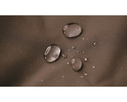 Prim-plan cu picături de apă pe material hidrofug