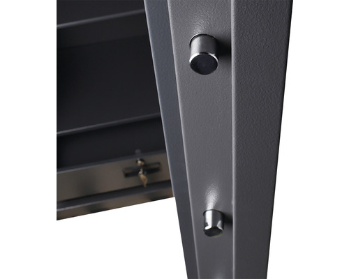 Prim-plan al unui seif cu șuruburi de blocare și chei