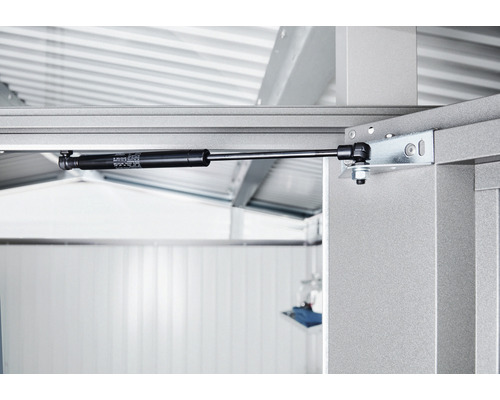 Imagine detaliată a unui amortizor pe gaz pe o construcție metalică