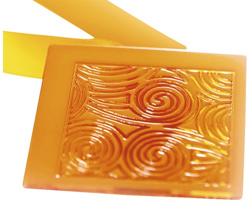 Placă decorativă în relief cu model spiralat