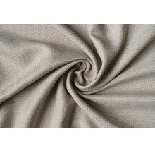 Prim-plan al unui balot de material textil cu structură textilă