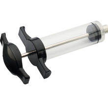 Seringă de injecție cu corp din plastic și piston metalic