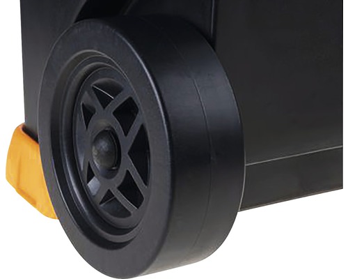 Prim-plan cu o roată neagră pe o cutie de scule