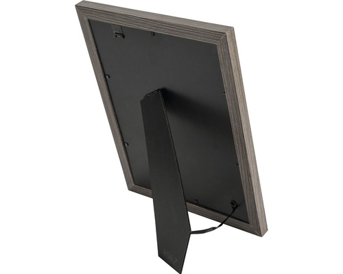 Vedere din spate a unei rame foto din lemn cu suport