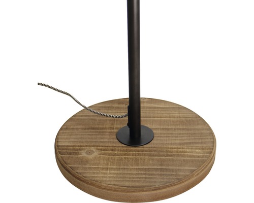 Detaliu al bazei unui lampadar din lemn și metal