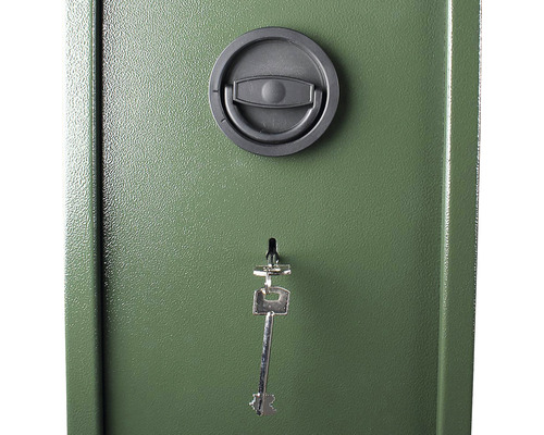 Detalii ale unei chei în broasca unei case de bani