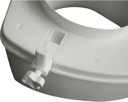 Detaliu al unui capac de toaletă din plastic cu fixare